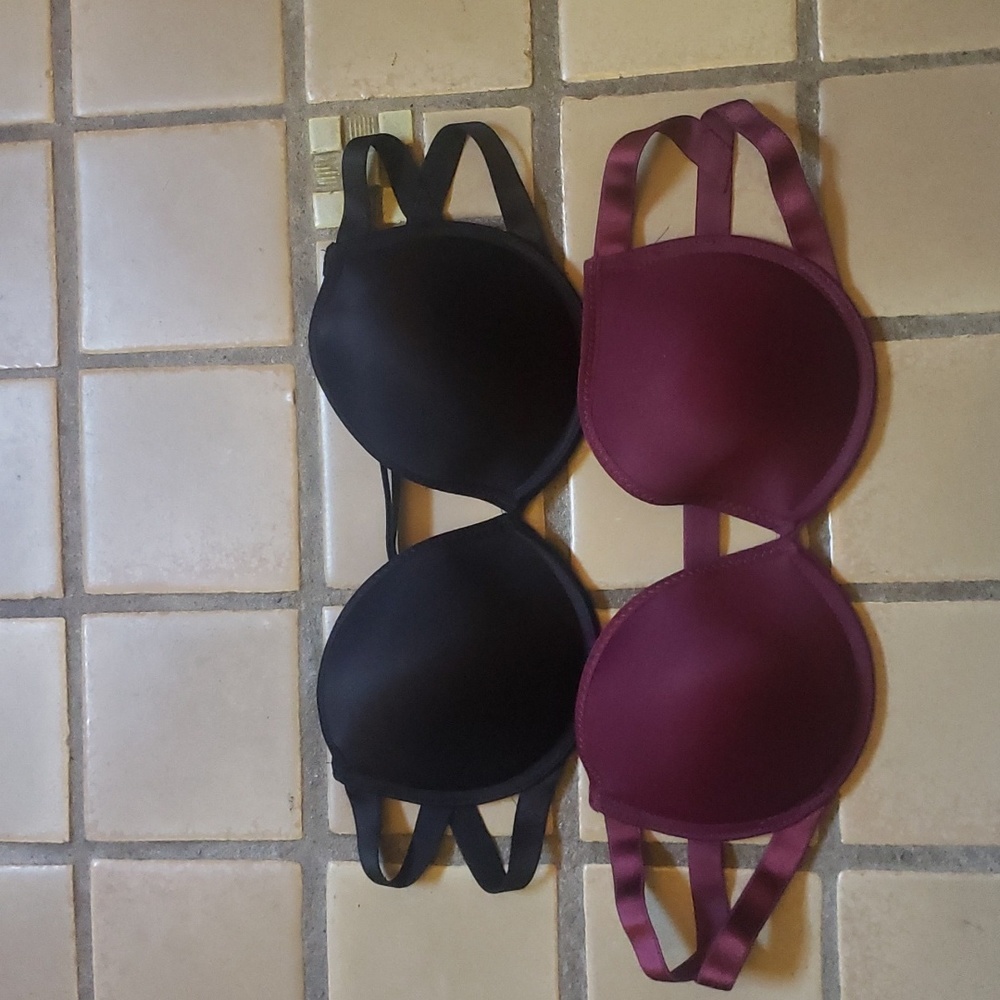 Strapless black and maroon bras with clear back straps
